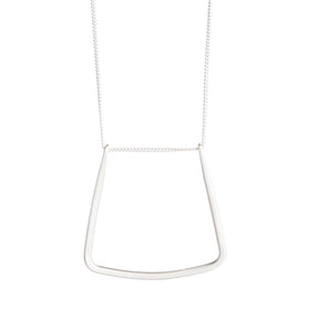 Sterling silver chain threaded through a hand-formed, sterling silver, u-shaped pendant with squared edges. Hand-crafted in Portland, Oregon. 