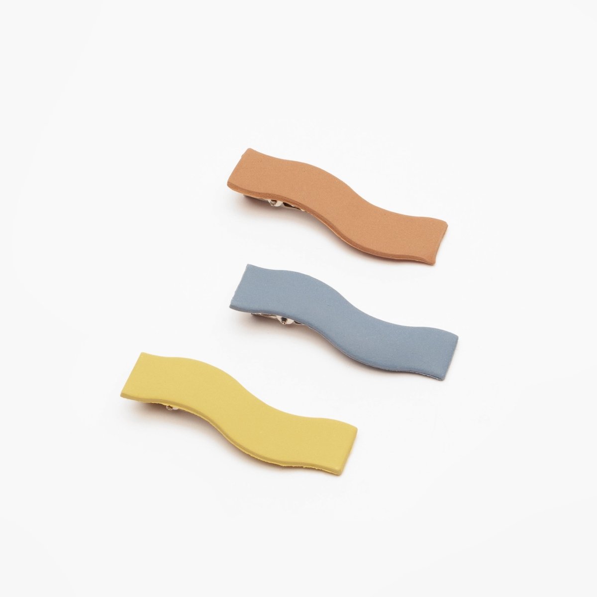 Wave Hair Clips by Hey Moon Designs. Made in Los Angeles, CA. Sold individually.