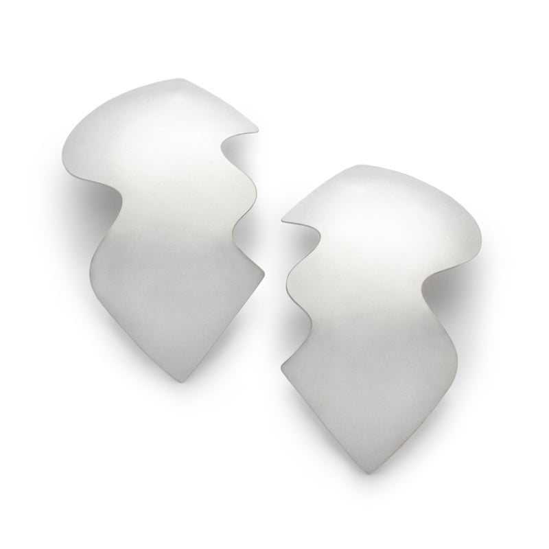 A pair of large, eye-catching, sterling silver shields with wavy edges, affixed to sterling silver earring posts. Hand-crafted in Portland, Oregon.