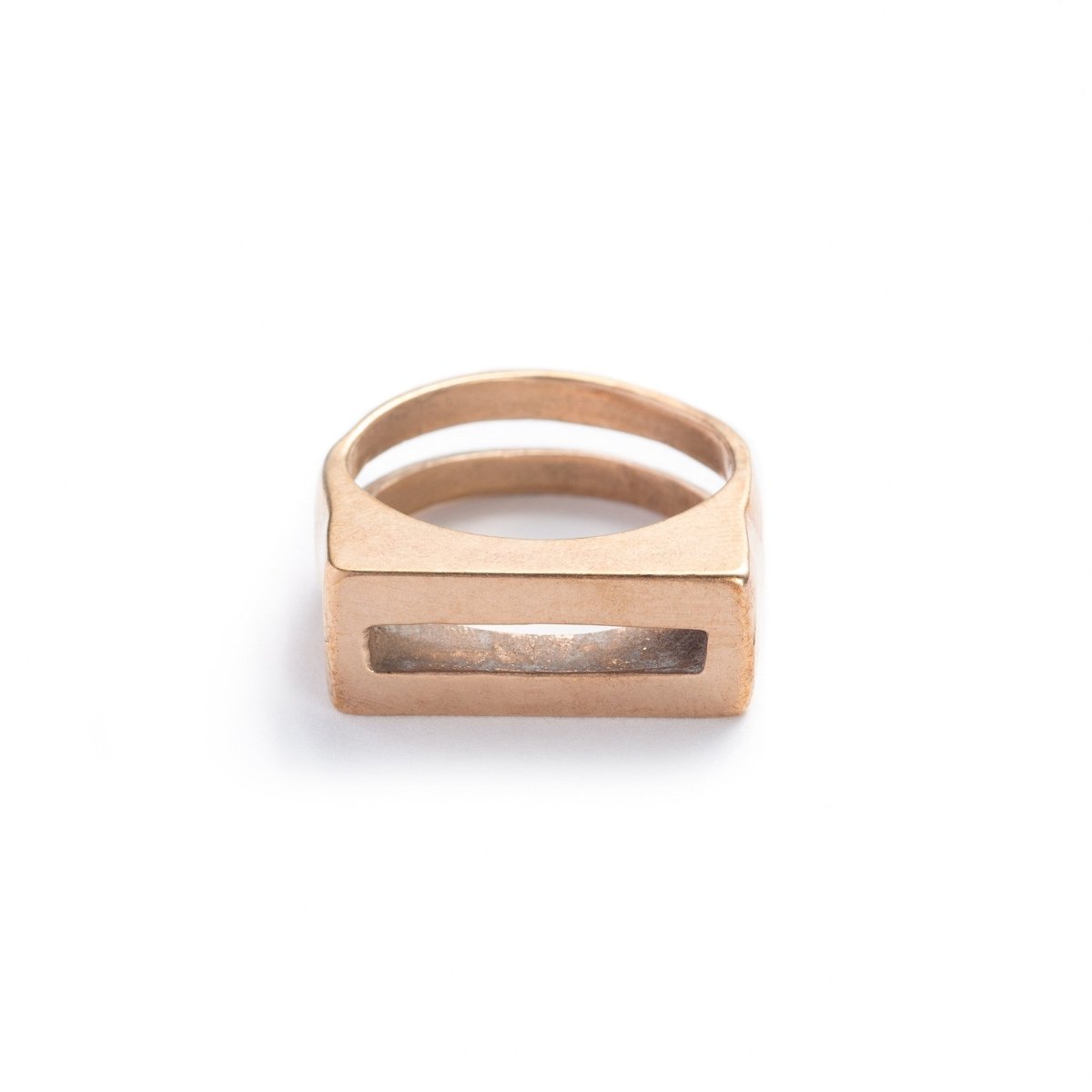 Solid, chunky, cast-bronze ring with a flat top and rectangular cutouts on the band and the top of the ring. Hand-crafted in Portland, Oregon.