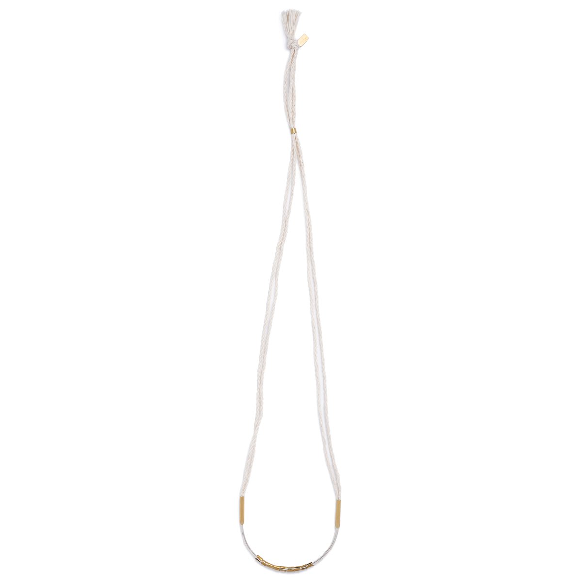 Lightweight, textural statement necklace, featuring cream-colored, hand-spun Japanese cotton rope, a curved, sterling silver focal point, African brass trade beads, and brass fittings. Hand-formed in Portland, Oregon.