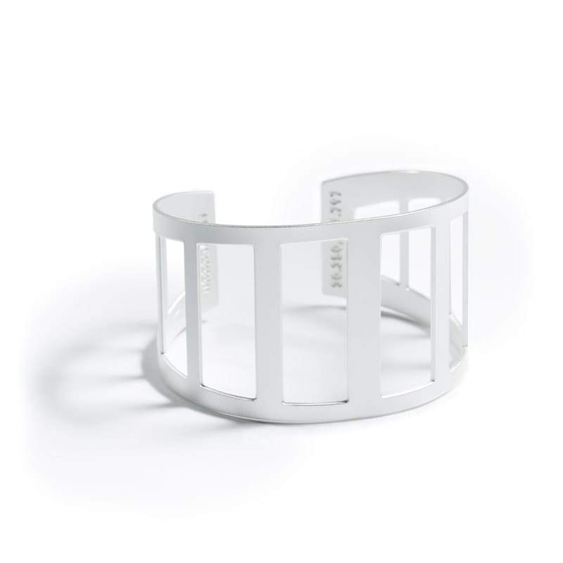 Modern, minimal, adjustable silver-plated cuff modeled after the 360 Bridge, also know as the Pennybacker Bridge, in Austin, Texas, with the bridge's coordinates and date of construction engraved on the inner cuff. Hand-crafted in Portland, Oregon.