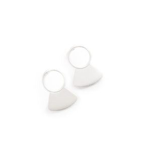 Small, silver-plated studs, featuring a delicate, open circle with a solid fan shape at the base, and sterling silver earring posts. Hand-crafted in Portland, Oregon.