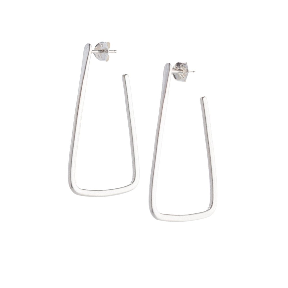 Simple, geometric, silver hoop earrings with curved edges and a matte finish, sterling silver earrings posts, and sterling silver butterfly earring backings. Hand-crafted in Portland, Oregon.