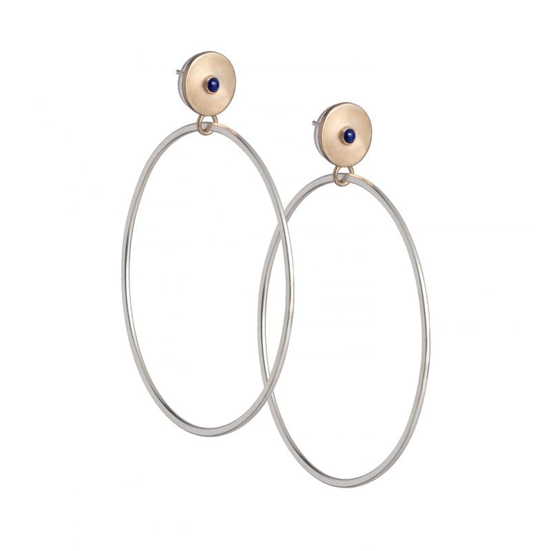 Sleek bronze studs featuring a bezel set, fair trade, and ethically sourced lapis lazuli, with large silver hoops dangling below. Hand-crafted in Portland, Oregon.