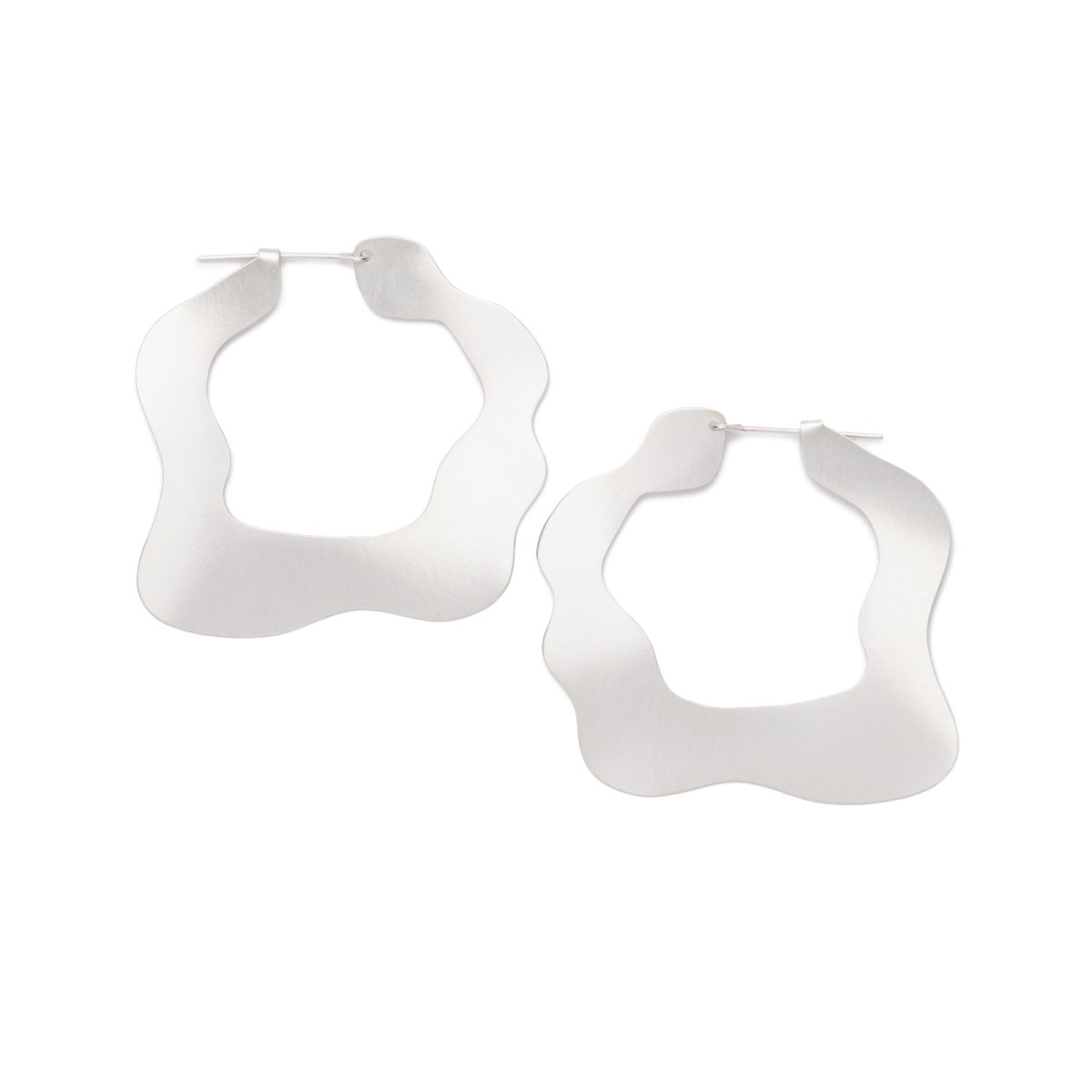 Large, glam, brushed sterling silver statement hoop earrings, featuring a flat profile and curvy edges, and completed with sterling silver-filled ear wires. Hand-crafted in Portland, Oregon.