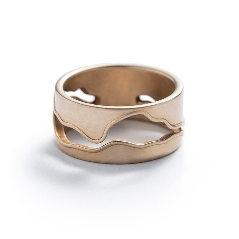 Thick, unisex, cast-bronze band, featuring a curved, wavy cutout modeled after the shape of the Willamette River in Portland, Oregon. Hand-crafted in Portland.