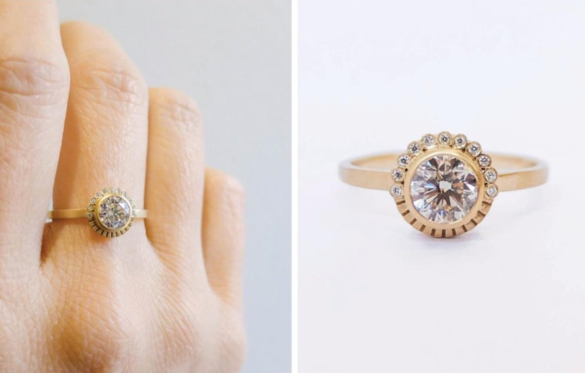 A custom-made betsy & iya yellow gold and white diamond ring with a diamond halo setting. Hand-crafted in Portland, Oregon.