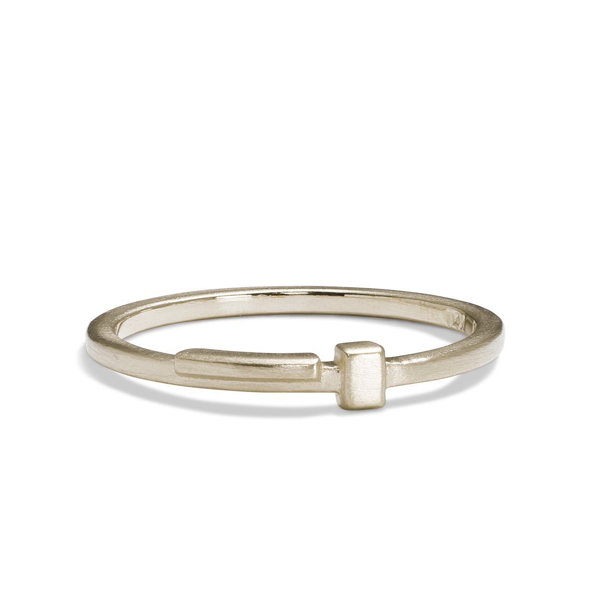 Linea ring, designed and made in our Portland studio. Geometric and linear motif in 14K recycled white gold.