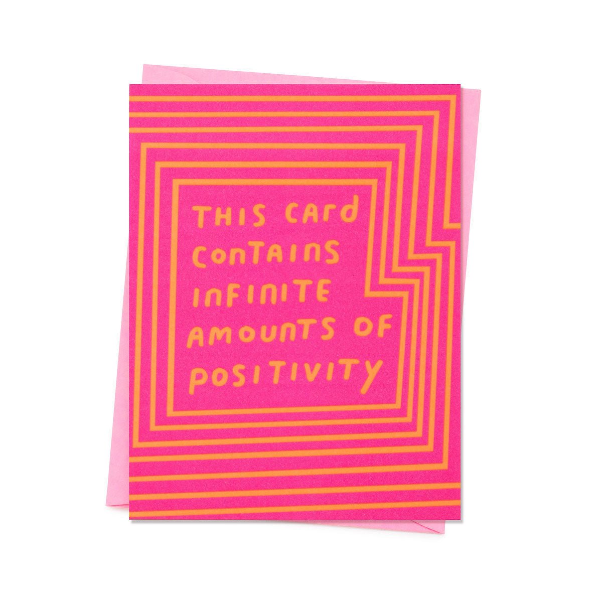 Neon pink card with bright orange lines framing the message: "THIS CARD CONTAINS INFINITE AMOUNTS OF POSITIVITY." Comes with a pink envelope. Designed by Ashkahn and Printed in Portland, OR.