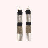 Two tier black beaded dangle earrings connected by strands of antique brass chains. Designed and handmade by A Nod To Design in Portland, Oregon.