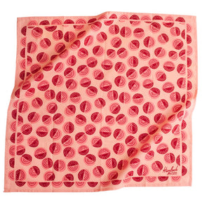 Pink bandana with pink and red circular pattern. Designed by Hemlock Goods in Fulton, MO and screen printed by hand in India. 