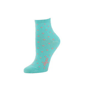 A bright blue sock with coral colored polka dots and the Kano logo along the arch. The Alice Polka Dot Anklet in Pool Blue is from Zkano and made in Alabama, USA.
