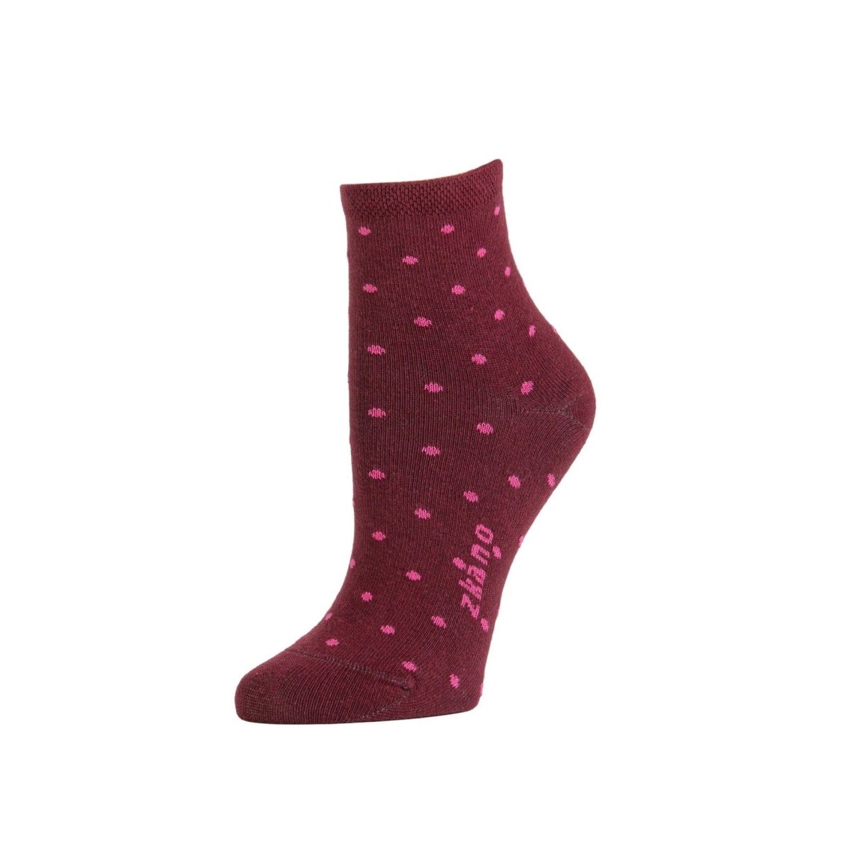 A maroon sock with bright pink polka dots with the Zkano logo along the arch. The Alice Anklet in Port is from Zkano and made in Alabama, USA.