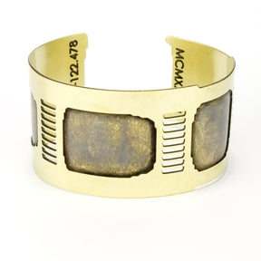 Front view of the brass Golden Gate cuff bracelet.