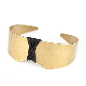 betsy & iya Arch's Shadow cuff bracelet with black leather.