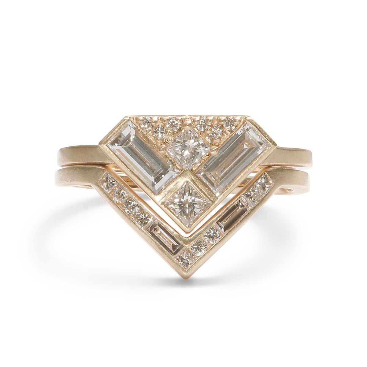 The Aurore ring stacked on top of the Altus ring. Both feature lab-grown diamonds and recycled 14K gold.