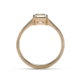 Peekaboo cut out of the Honos ring. It features an emerald cut lab-grown diamond (1.1 carat), and set in 14K recycled gold.