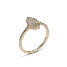 Pear-shaped Ignis ring. Features a salt & pepper diamond set in recycled 14K gold. All stones and materials are conflict free.