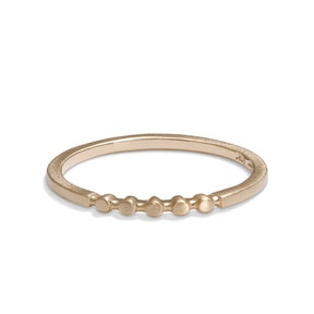 Circle motif Itero ring in 14K recycled gold. Designed and crafted in our Portland production studio.