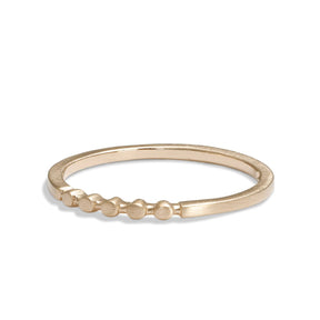Circle motif Itero ring in 14K recycled gold. Designed and crafted in our Portland production studio.