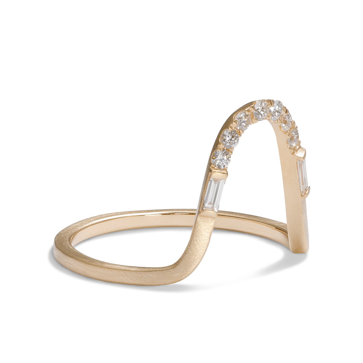 Arched stacking Levo ring. Features lab-grown diamonds in a pavé setting and a 14K recycled gold band.