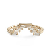 V-shaped geometric Montis stacking ring. Features lab-grown baguette diamonds and 14K recycled gold.