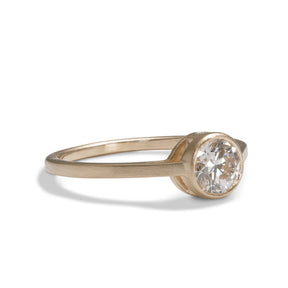 0.6 carat Sano ring, with 3 brilliant cut lab-grown diamonds set in a recycled 14K gold band. Designed and handcrafted in Portland, Oregon.