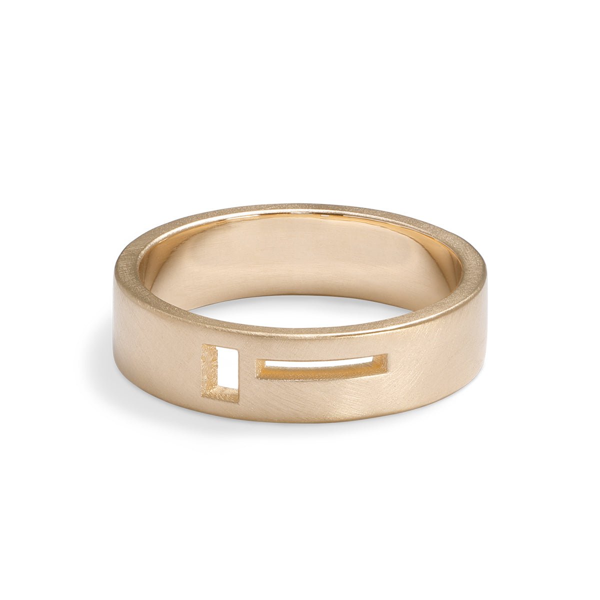 Wide band Sero ring. Features geometric cut-out band in 14K recycled gold. Designed and crafted in Portland, Oregon.