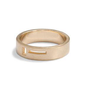 Wide band Sero ring. Features geometric cut-out band in 14K recycled gold. Designed and crafted in Portland, Oregon.