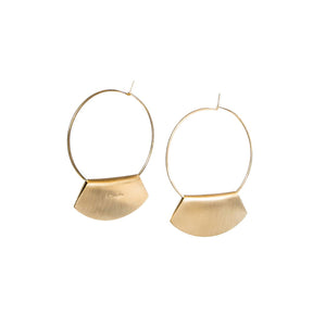 Hand-formed hoop earrings of 14k gold-fill wire, with folded, fan-shaped, 14k gold-filled pendants, engraved with the Betsy & Iya logo. Hand-crafted in Portland, Oregon.