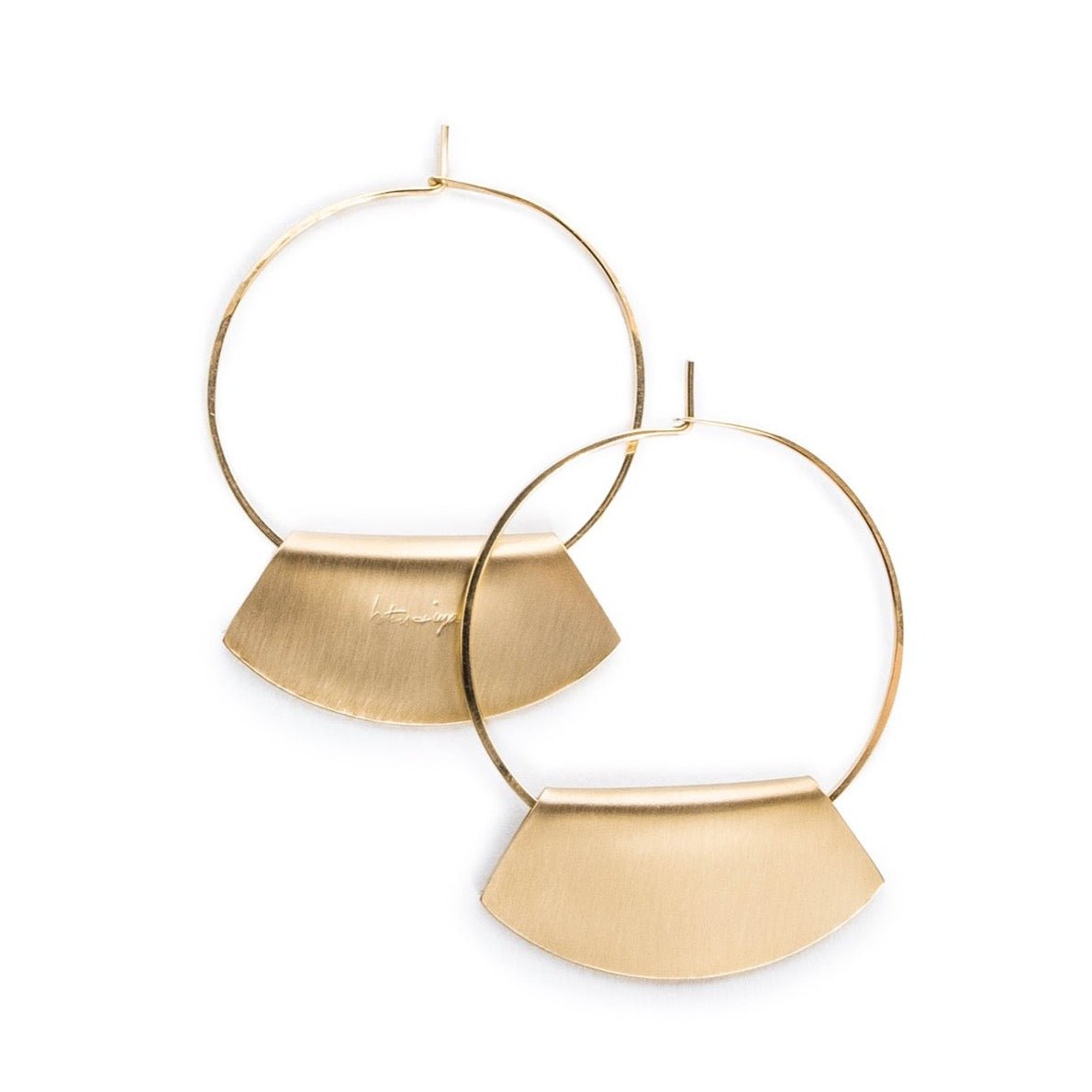 Hand-formed hoop earrings of 14k gold-fill wire, with folded, fan-shaped, 14k gold-filled pendants, engraved with the betsy & iya logo. Hand-crafted in Portland, Oregon.
