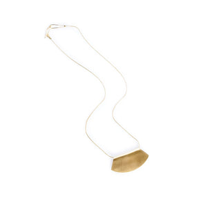 Delicate, 18 inch long, 14k gold-filled chain threaded through a fan-shaped 14k gold-filled pendant, engraved on one side with the betsy & iya logo. Hand-crafted in Portland, Oregon.