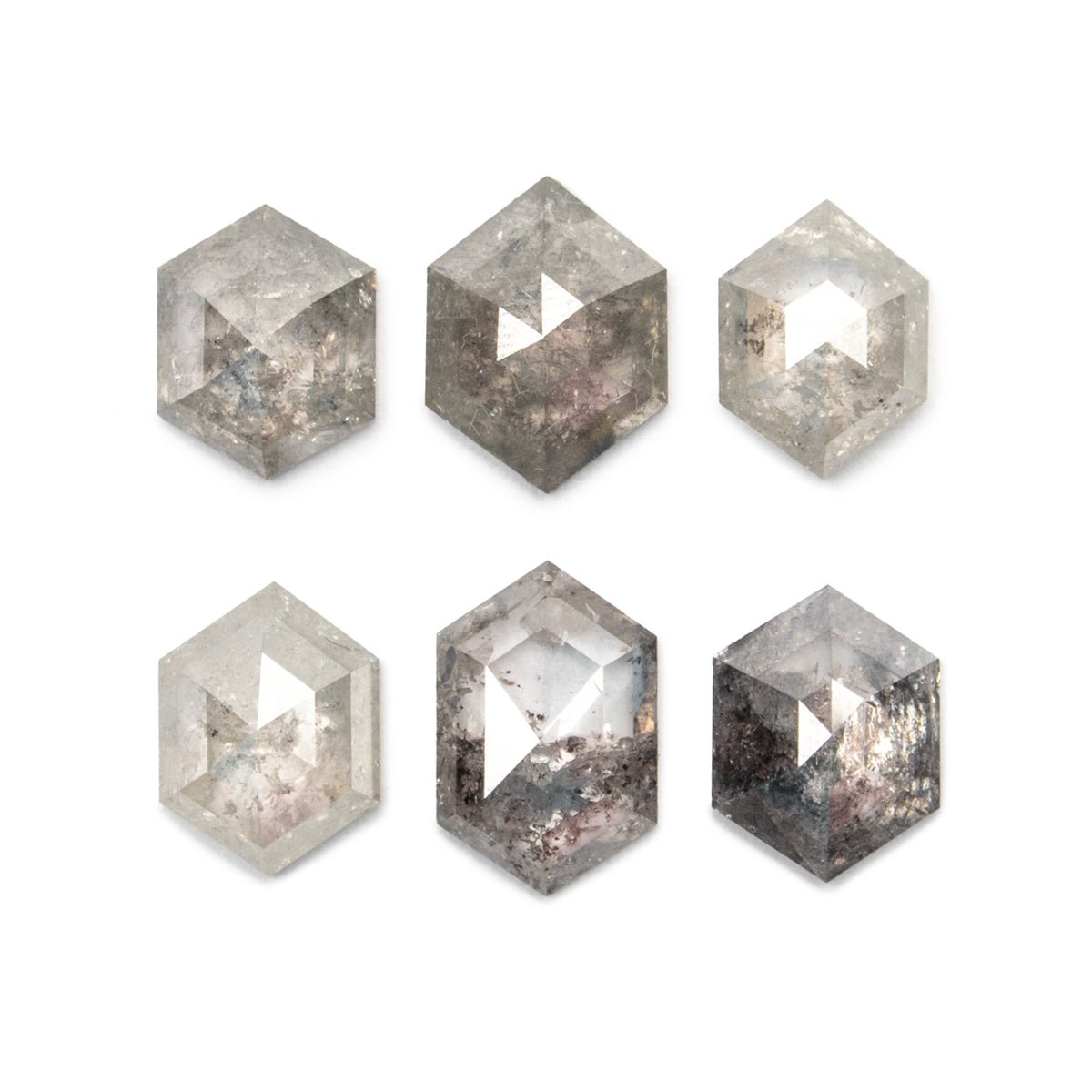 Each stone for this ring is unique and untreated, and may not look exactly as the product photo. This is an example of the gemstone variations, which can range in hue, intensity, and clarity or inclusions. 