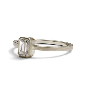 Emerald cut lab-grown diamond Honos ring (0.5 carat). Set in 14K recycled white gold and made in Portland, Oregon.