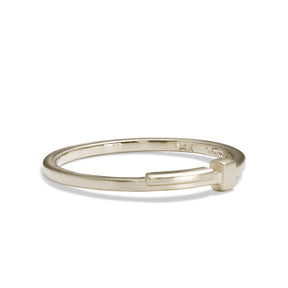 Linea ring, designed and made in our Portland studio. Geometric and linear motif in 14K recycled white gold.