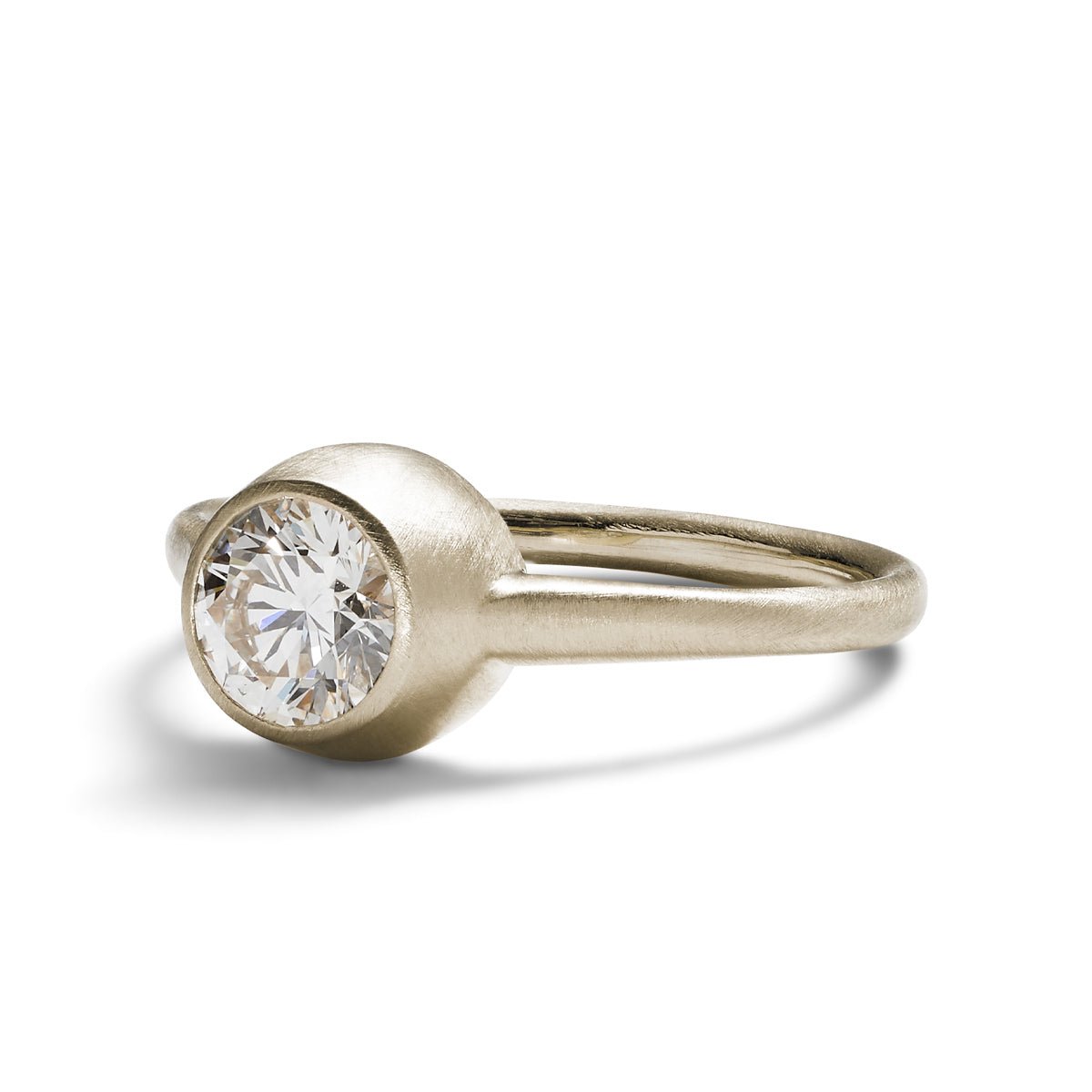 Modern statement Salire ring from Betsy & Iya. Features a round brilliant-cut lab-grown diamond (0.7 ct) and 14K white gold. Designed and handcrafted in our Portland, Oregon studio.