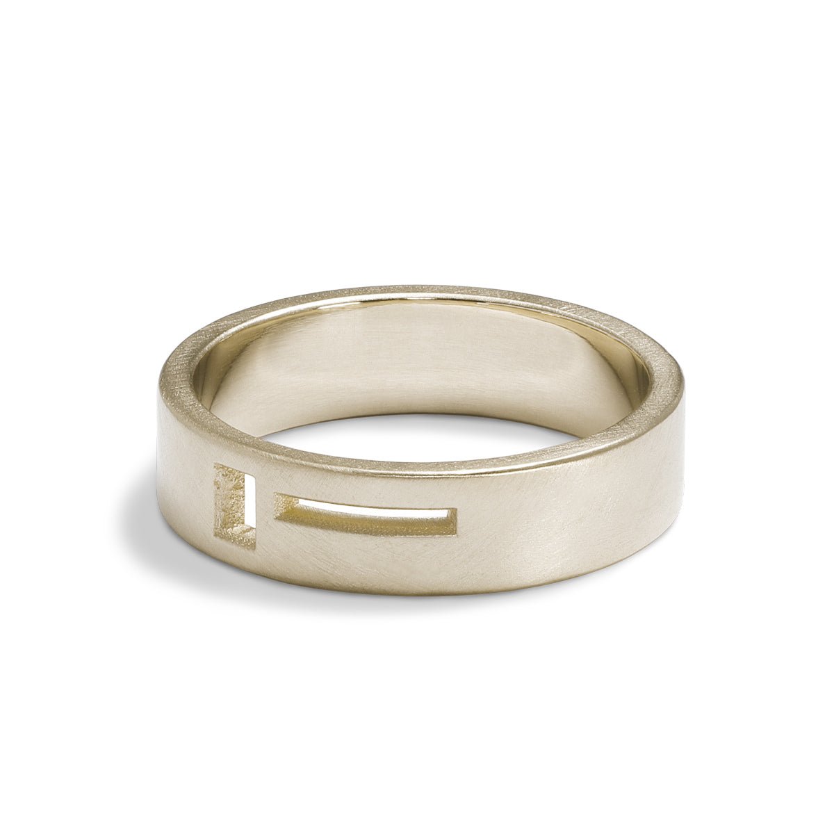 Wide band Sero ring. Features geometric cut-out band in 14K recycled white gold. Designed and crafted in Portland, Oregon.