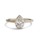 Modern pear shaped Votum ring from Betsy & Iya. With a 14K white gold band and lab-grown diamond (1 ct).
