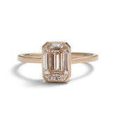 Honos ring in a 14K recycled white gold band with an emerald cut lab-grown diamond (1.75 ct).