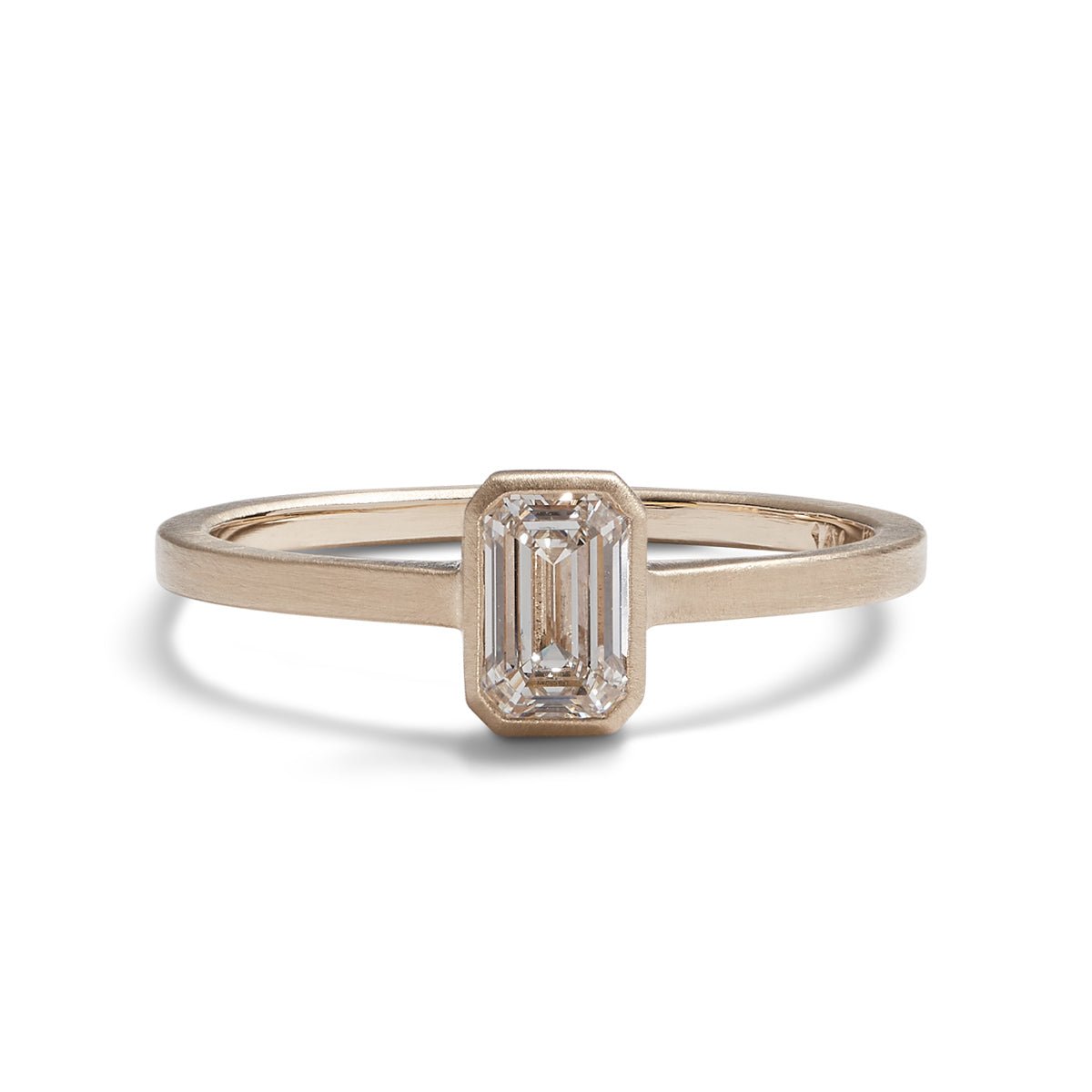 Emerald cut lab-grown diamond Honos ring (0.5 carat). Set in 14K recycled gold and made in Portland, Oregon.