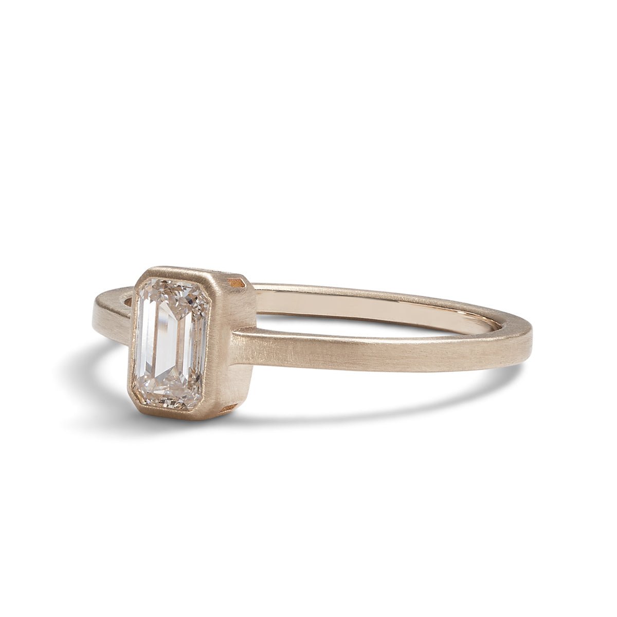 Emerald cut lab-grown diamond Honos ring (0.5 carat). Set in 14K recycled gold and made in Portland, Oregon.