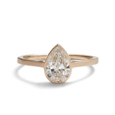 Modern pear shaped Votum ring from Betsy & Iya. With a 14K gold band and lab-grown diamond (1 ct).