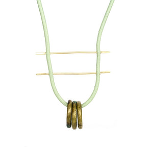 betsy & iya Catenary Ring necklace with African trade beads.