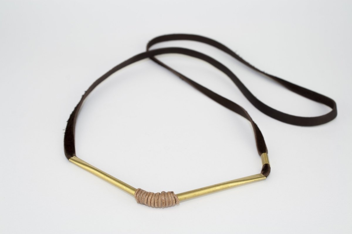 A different view of betsy & iya Autumn in the Park necklace with chevron brass and leather wrap.