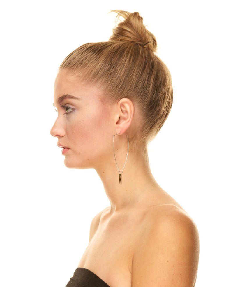 Sterling silver-filled betsy & iya Badlands Hoop earrings. Mixed metals and subtle movement in delicate jewelry.