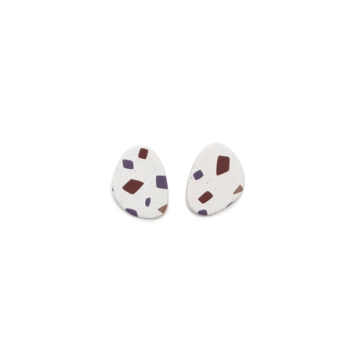A pair of round polymer clay earrings with a brown/mauve and purple terrazzo pattern. Designed and crafted in Portland, Oregon by The Baked Clay Studio.