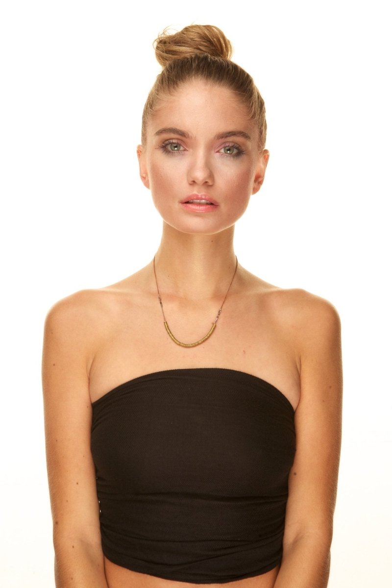 A model wearing the helio necklace.