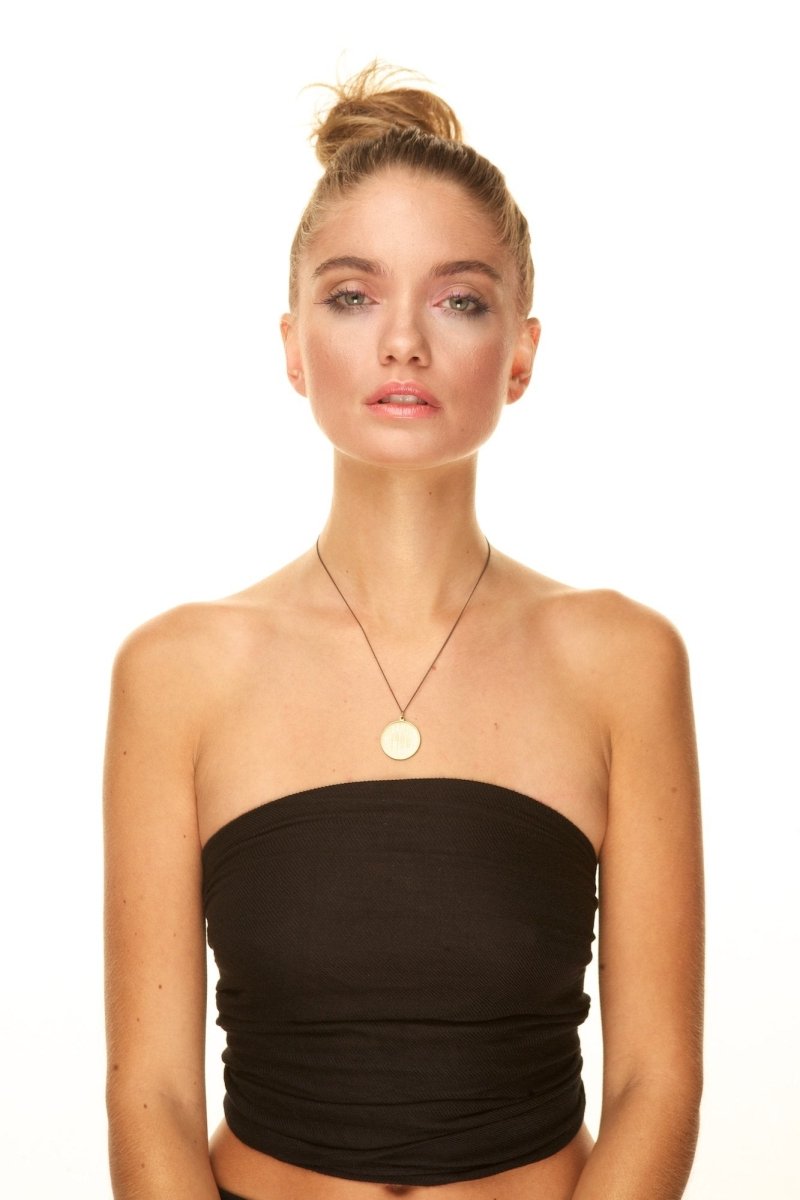 Model shot of betsy & iya Big Amour necklace.