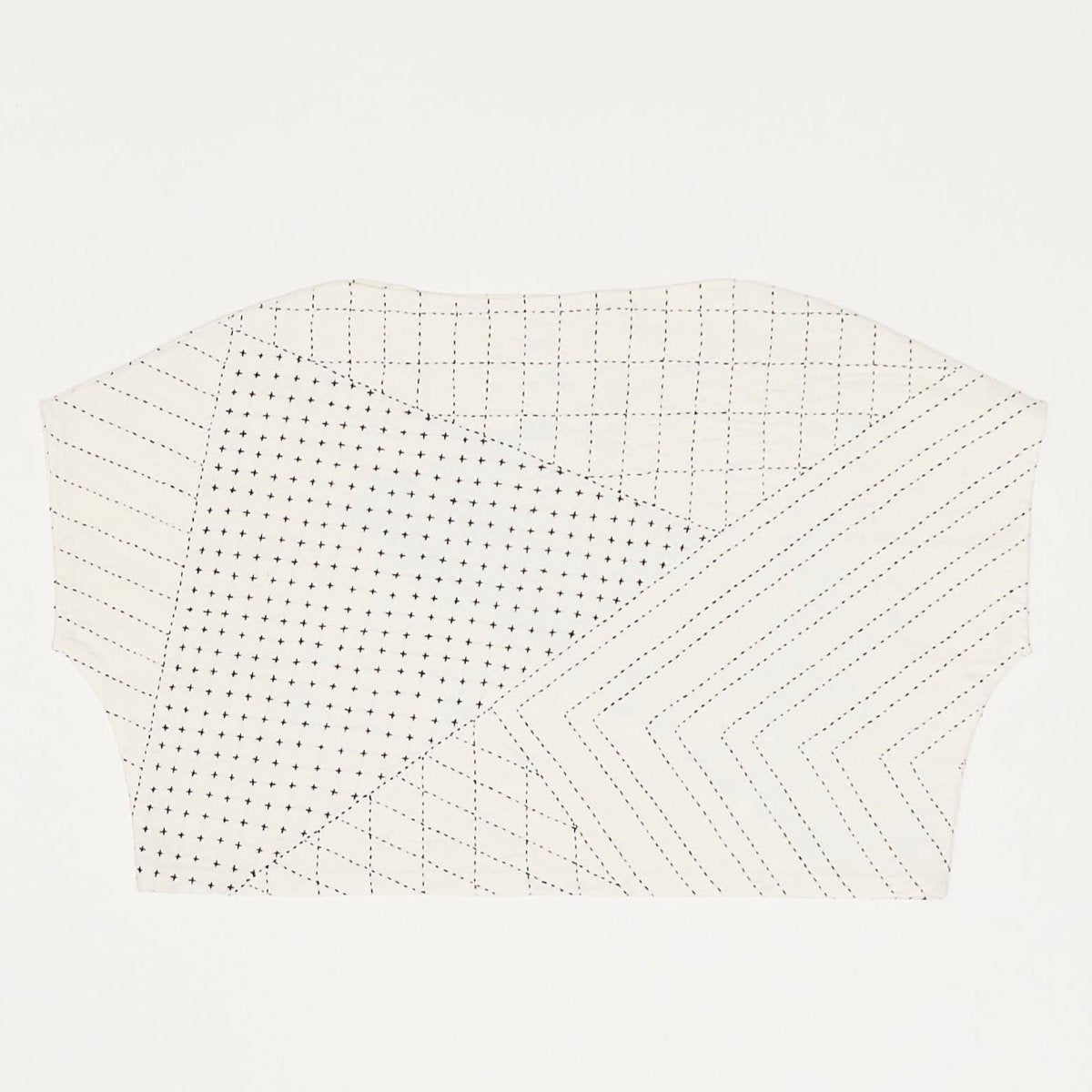 Short sleeve canvas cotton box top with a black hand embroidered pattern. The Box Top in Bone is designed by Anchal in Louisville, Kentucky and handmade in Ajmer, India.